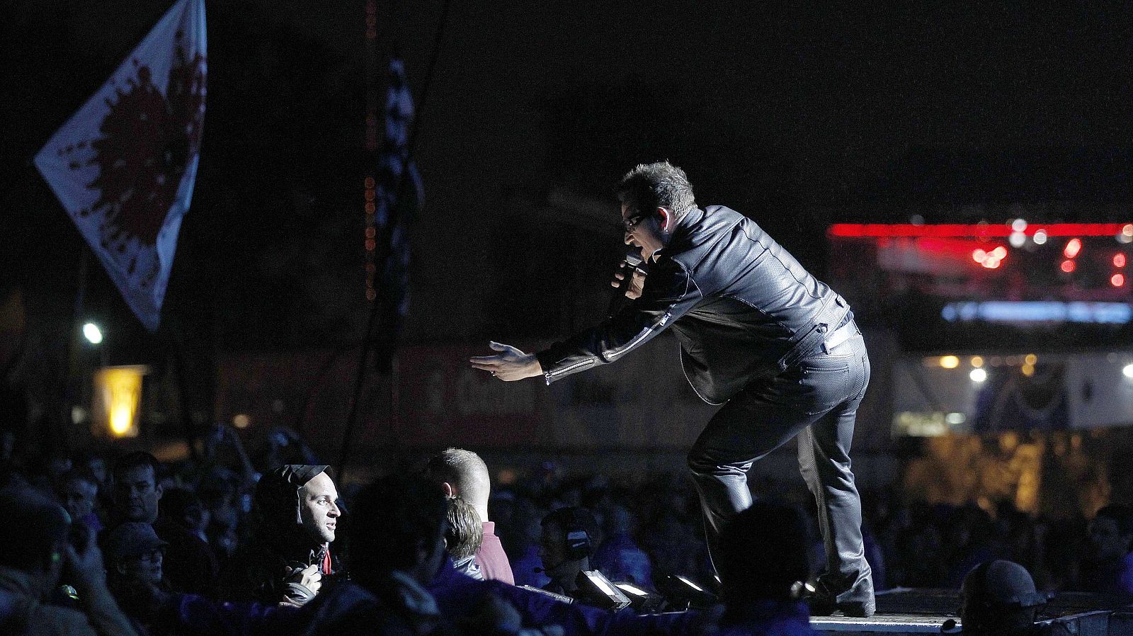 Bono, lead singer of Irish band U2, performs on the third day of the Glastonbury Festival in Worthy Farm, Somerset