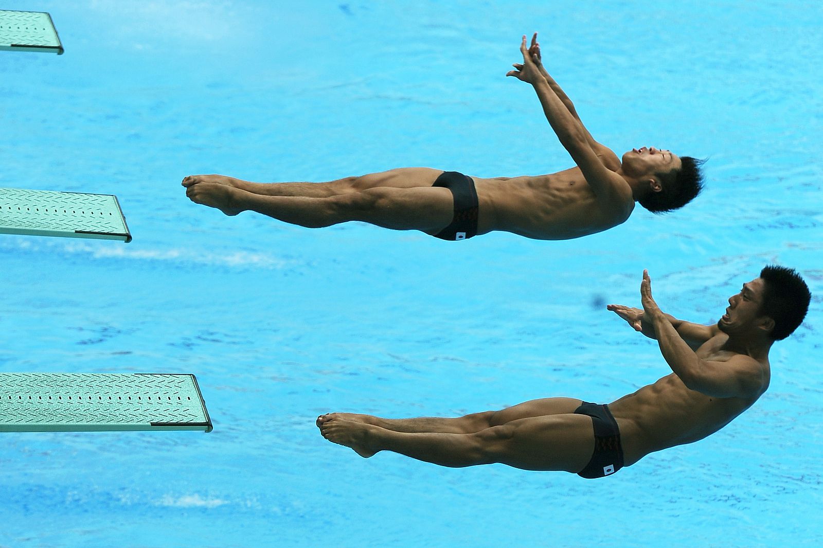 La pareja de salto sincronizado formada por Lin Yue y Huo Liang, oro en los Juegos Olímpicos de Pekín 2008, durante los entrenamientos previos al Mundial de Shanghái