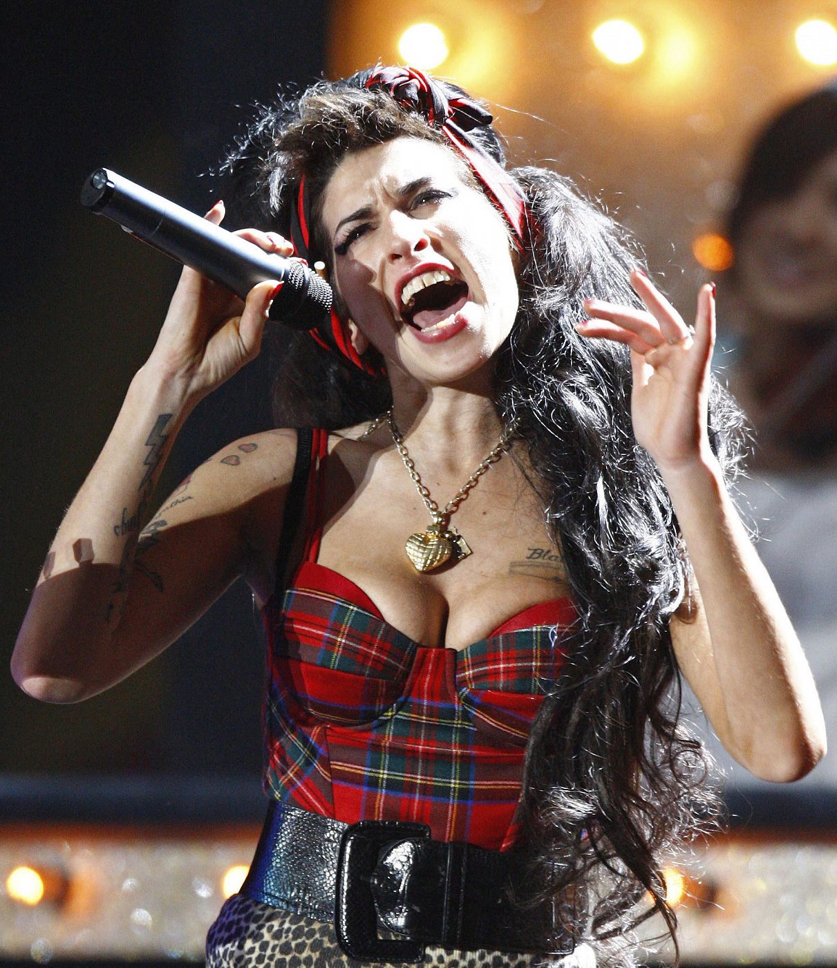 File photo of British singer Amy Winehouse performing at the Brit Awards at Earls Court in London