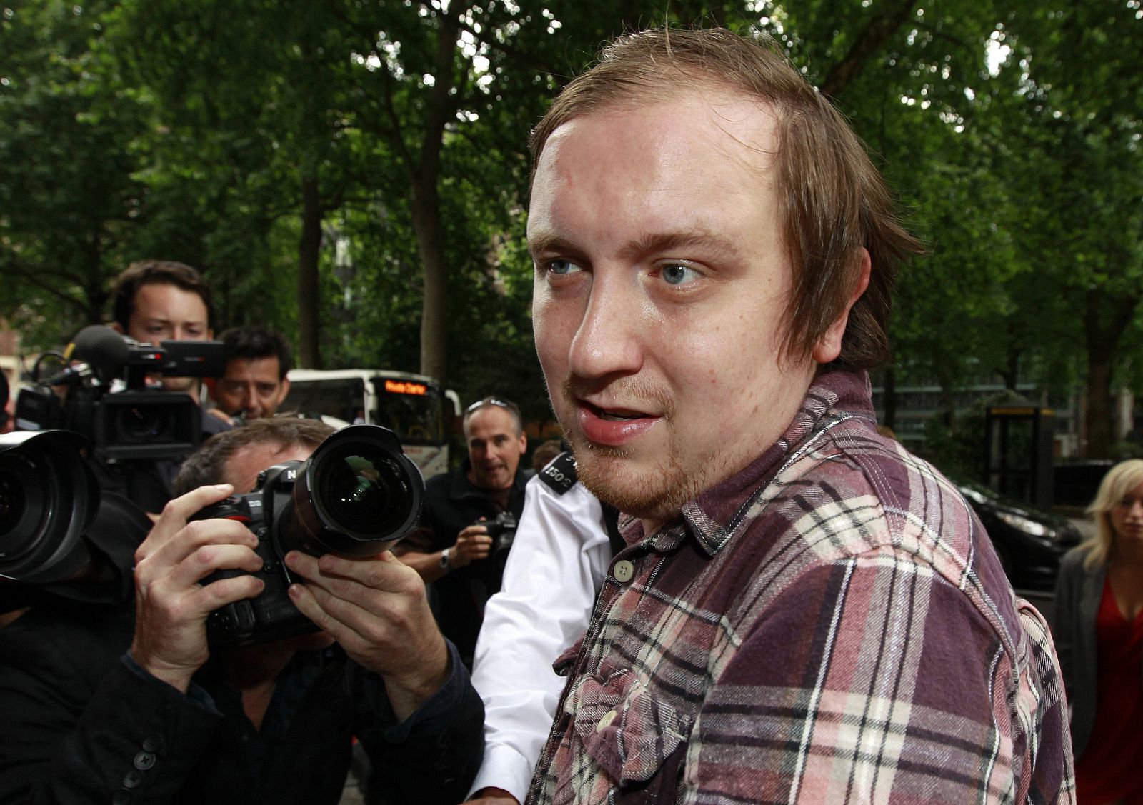 May-Bowles makes his way past cameras as he arrives for sentencing at City of Westminster Magistrates' Court in London