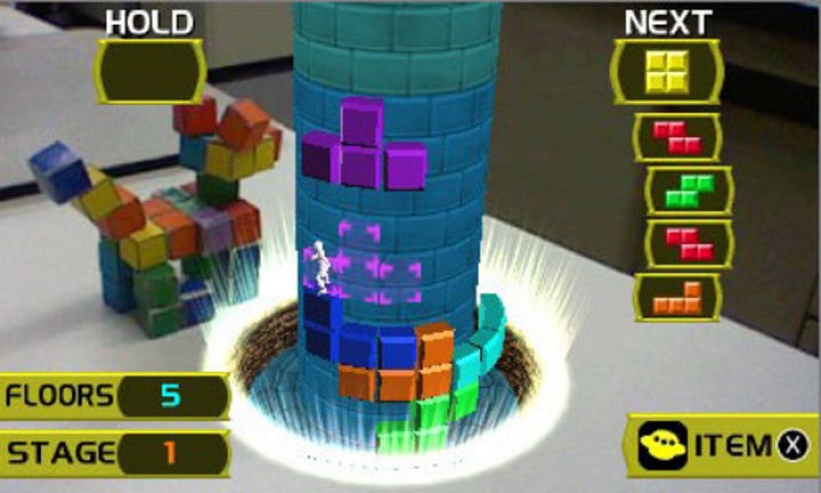 Con una tarjeta de realidad aumentada el juego se proyecta fuera de la consola en 3D sin necesidad de gafas.
