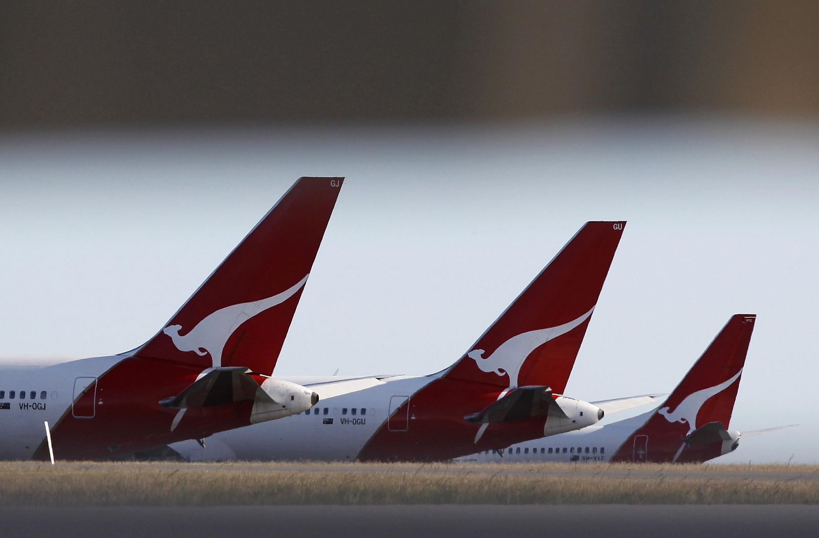 Qantas planes are seen grounded at Perth international airport