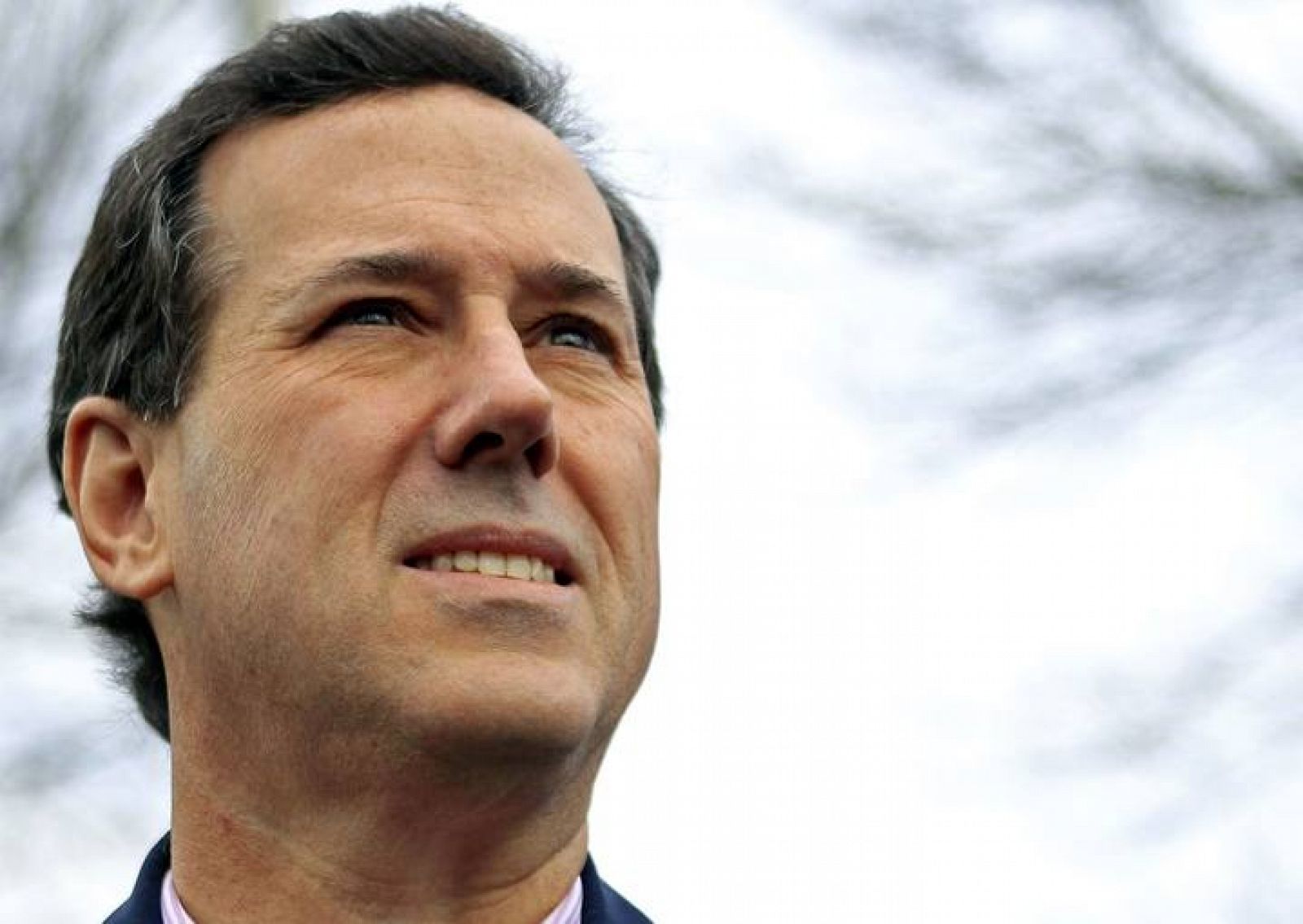 Republican presidential candidate and former Pennsylvania Senator Santorum waits to be introduced at a campaign rally in Nashua