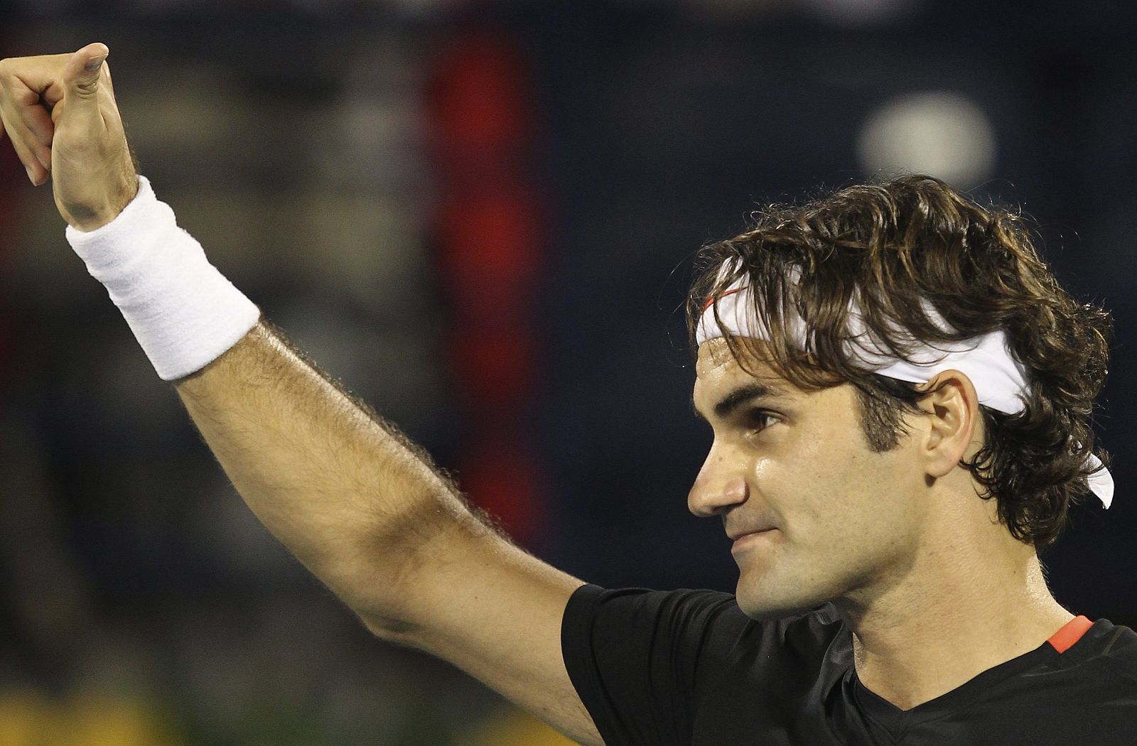 El tenista suizo Roger Federer celebra su victoria en Dubai