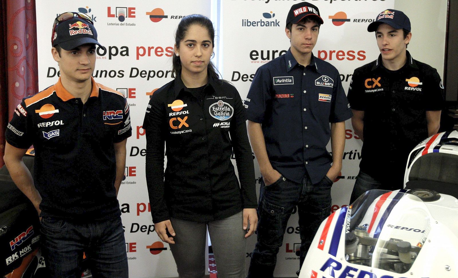 Los pilotos españoles Dani Pedrosa, María Herrera, Maverik Viñales y Marc Márquez, en el desayuno informativo celebrado en Madrid.