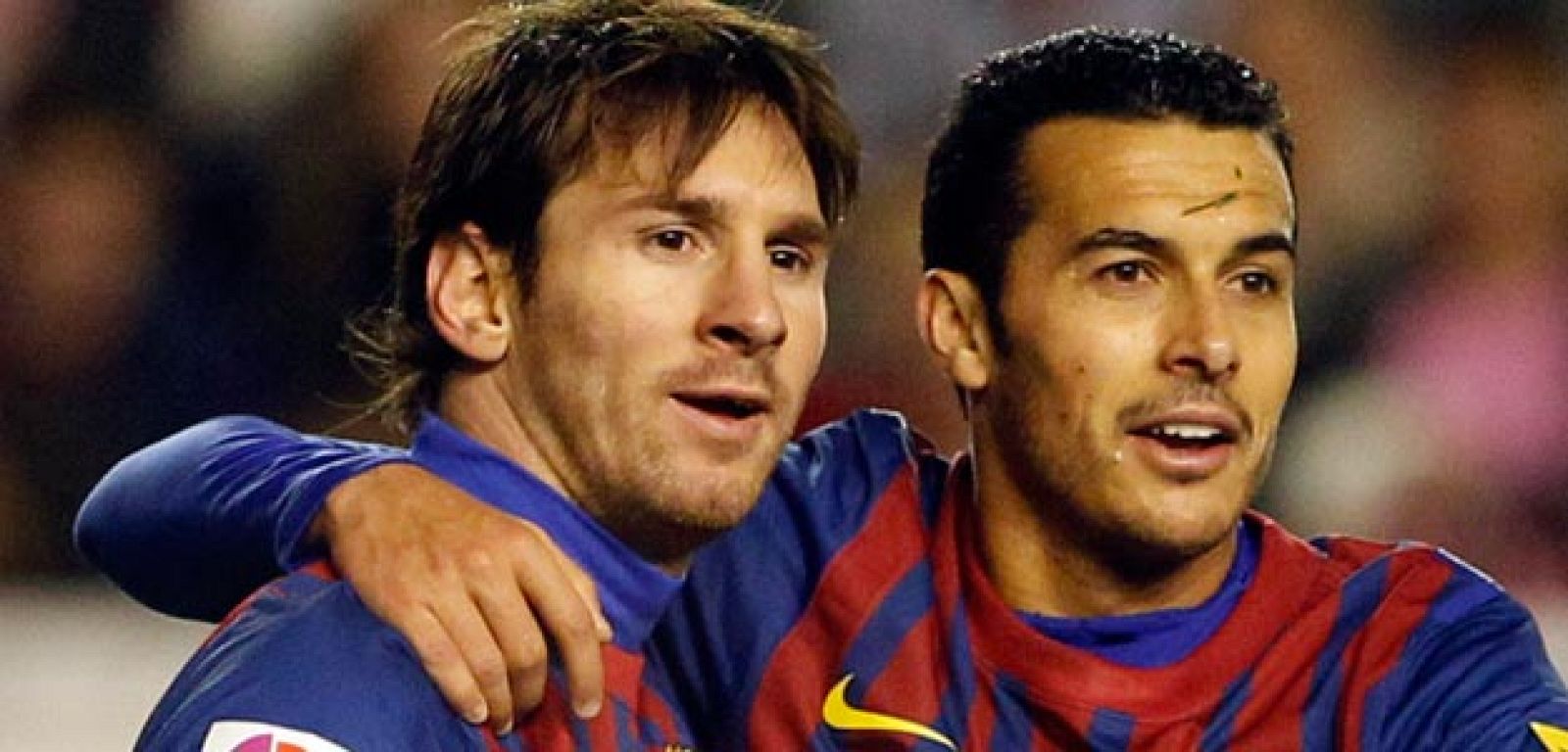 Pedro celebra con Messi uno de sus goles el pasado miércoles ante el Málaga