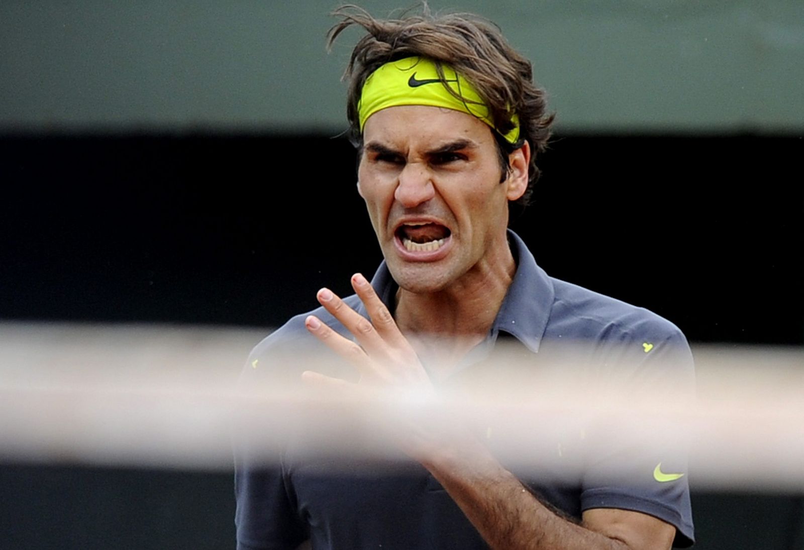 Roger Federer gritando en el partido ante Del Potro