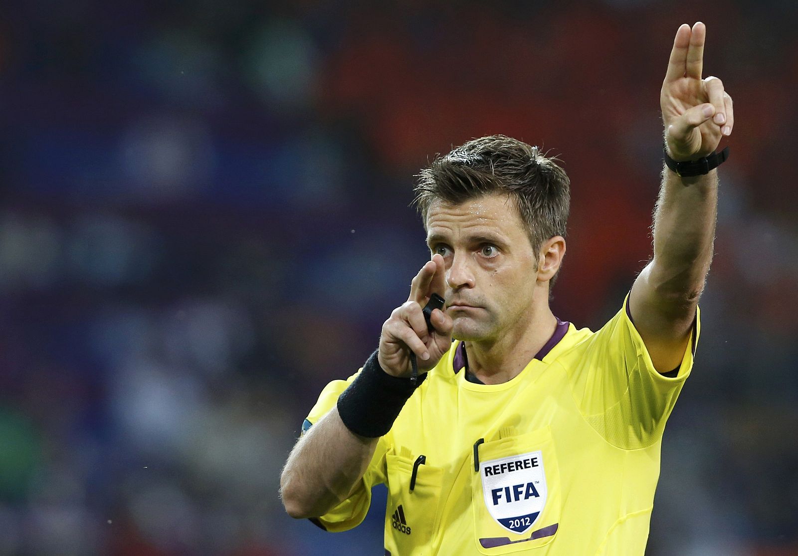 Referee Rizzoli of Italy reacts during their Group B Euro 2012 soccer match between Portugal and Netherlands at the Metalist stadium in Kharkiv