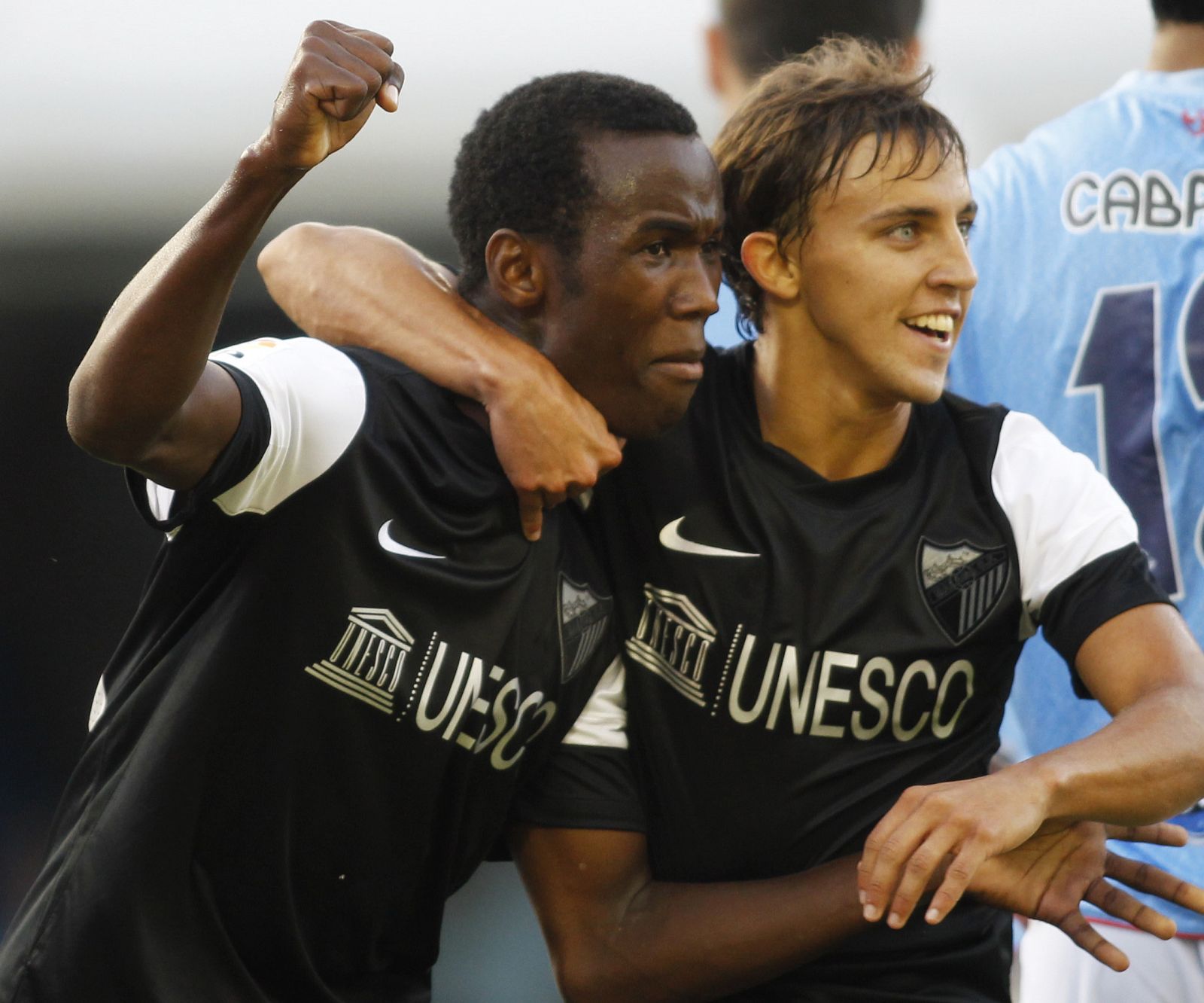 Fabrice celebra con Buonanotte su gol para el Málaga contra el Celta de Vigo