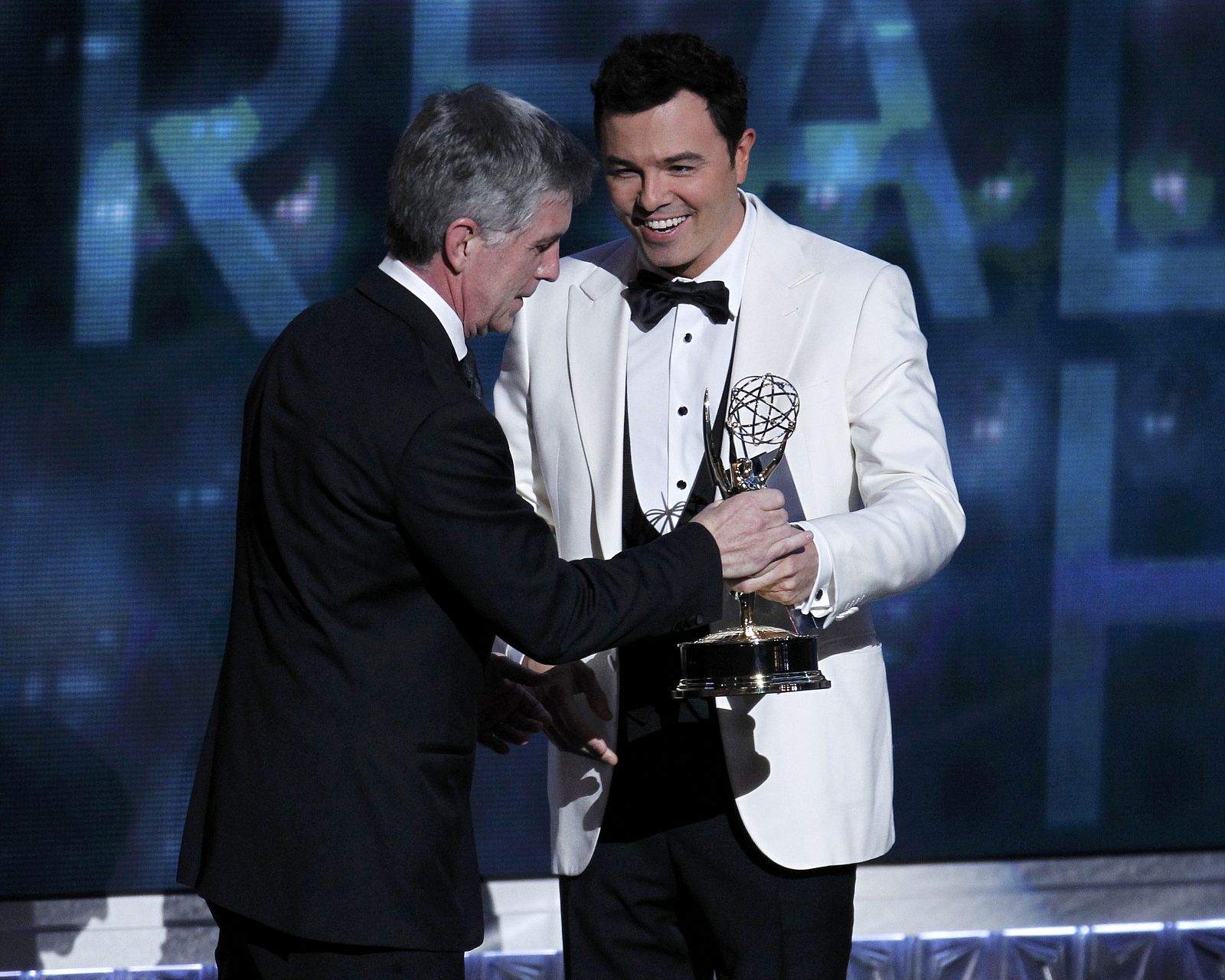 McFarlane presents the award for outstanding reality show host to Bergeron at the 64th Primetime Emmy Awards in Los Angeles