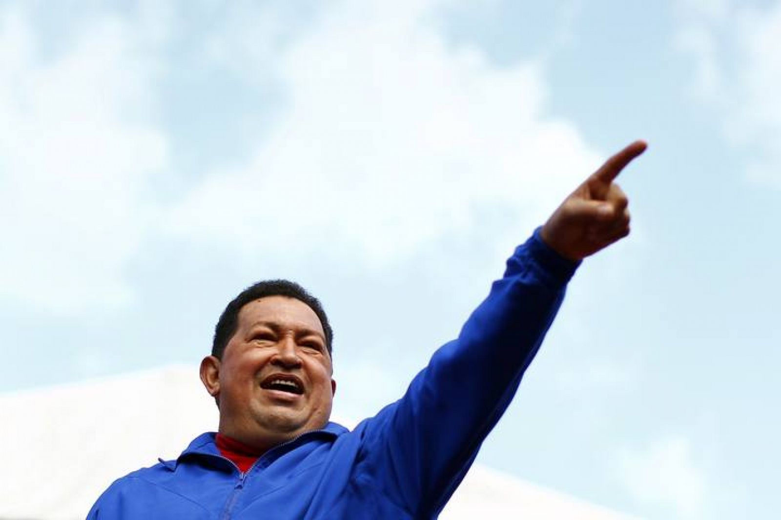 Venezuela's President and presidential candidate Hugo Chavez gestures to supporters during a campaign rally in Maracay