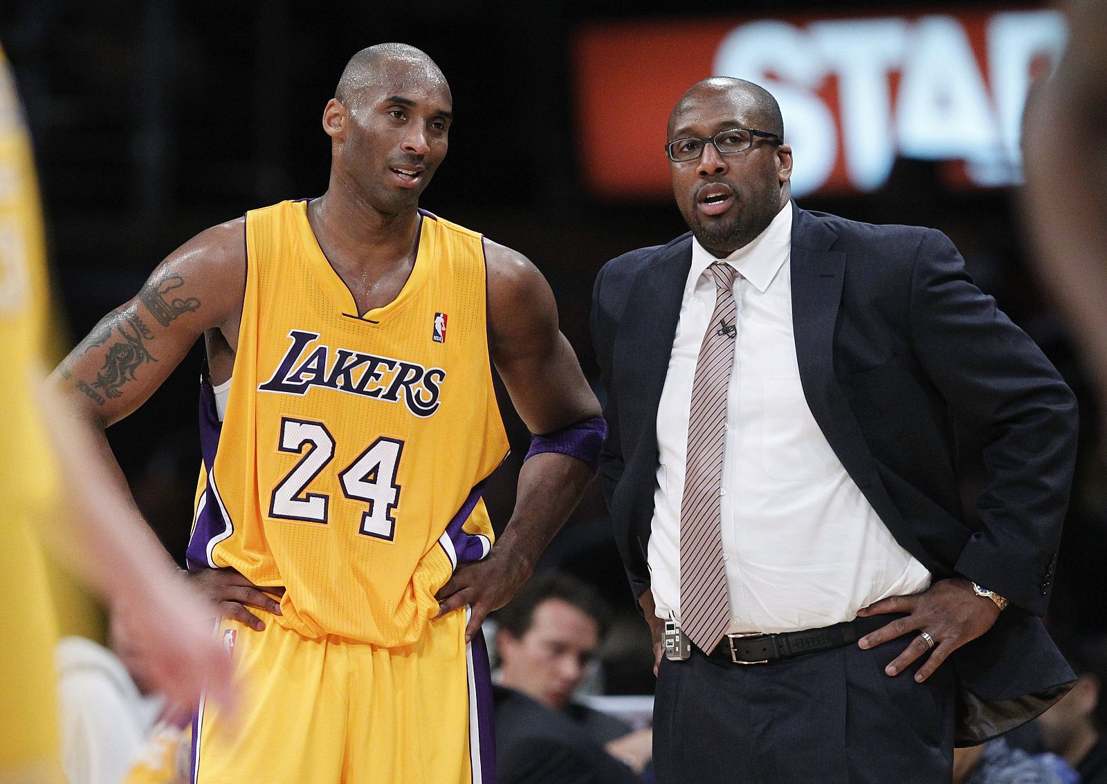 File photo of Los Angeles Lakers' Bryant chatting to coach Brown during their NBA Western Conference playoff against Denver Nuggets in Los Angeles