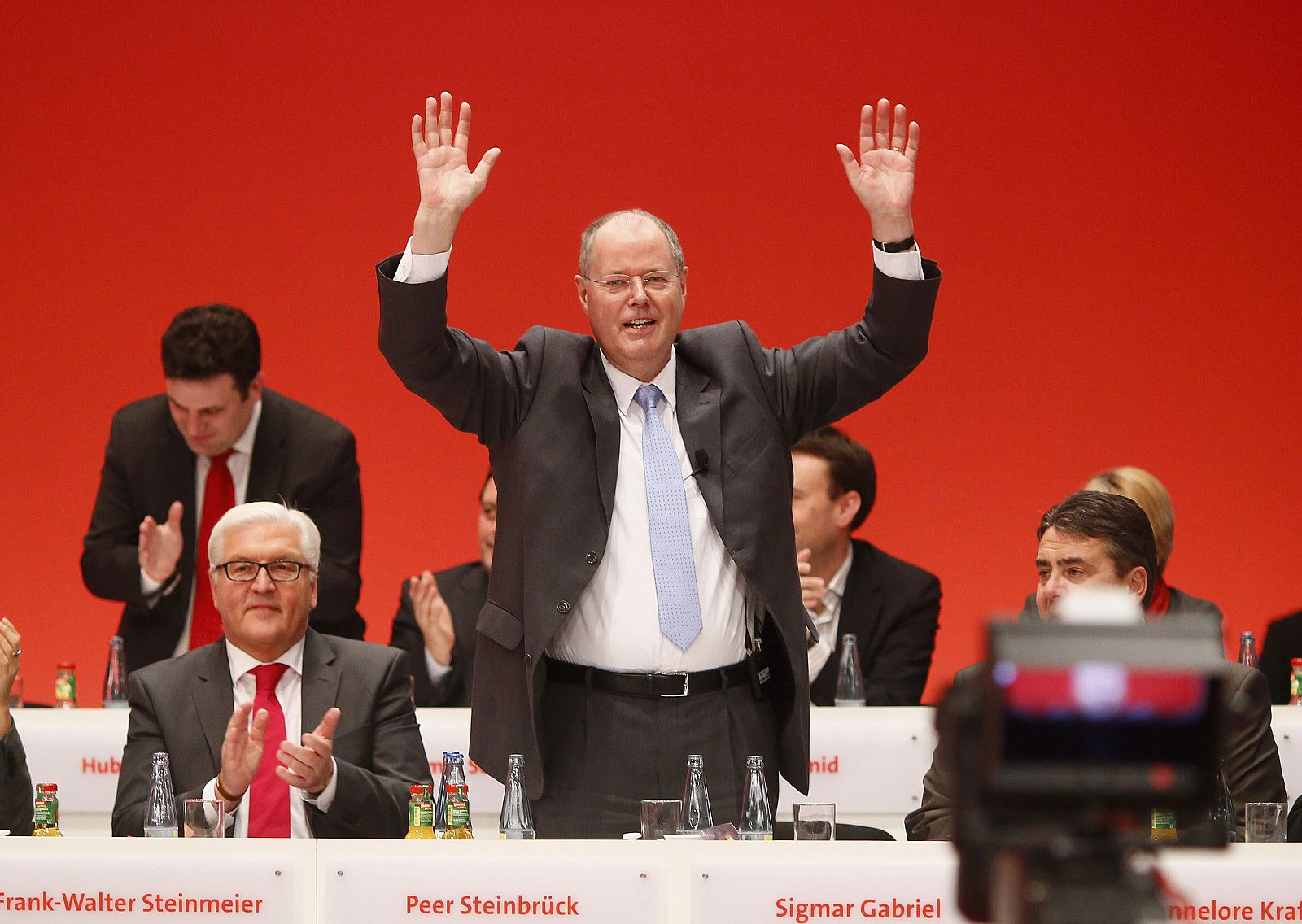 Designated top candidate of the German Social Democratic Party (SPD) for the 2013 German general elections, Steinbrueck acknowledges the applause of the audience after his speech during the extraordinary party meeting of the SPD in Hanover