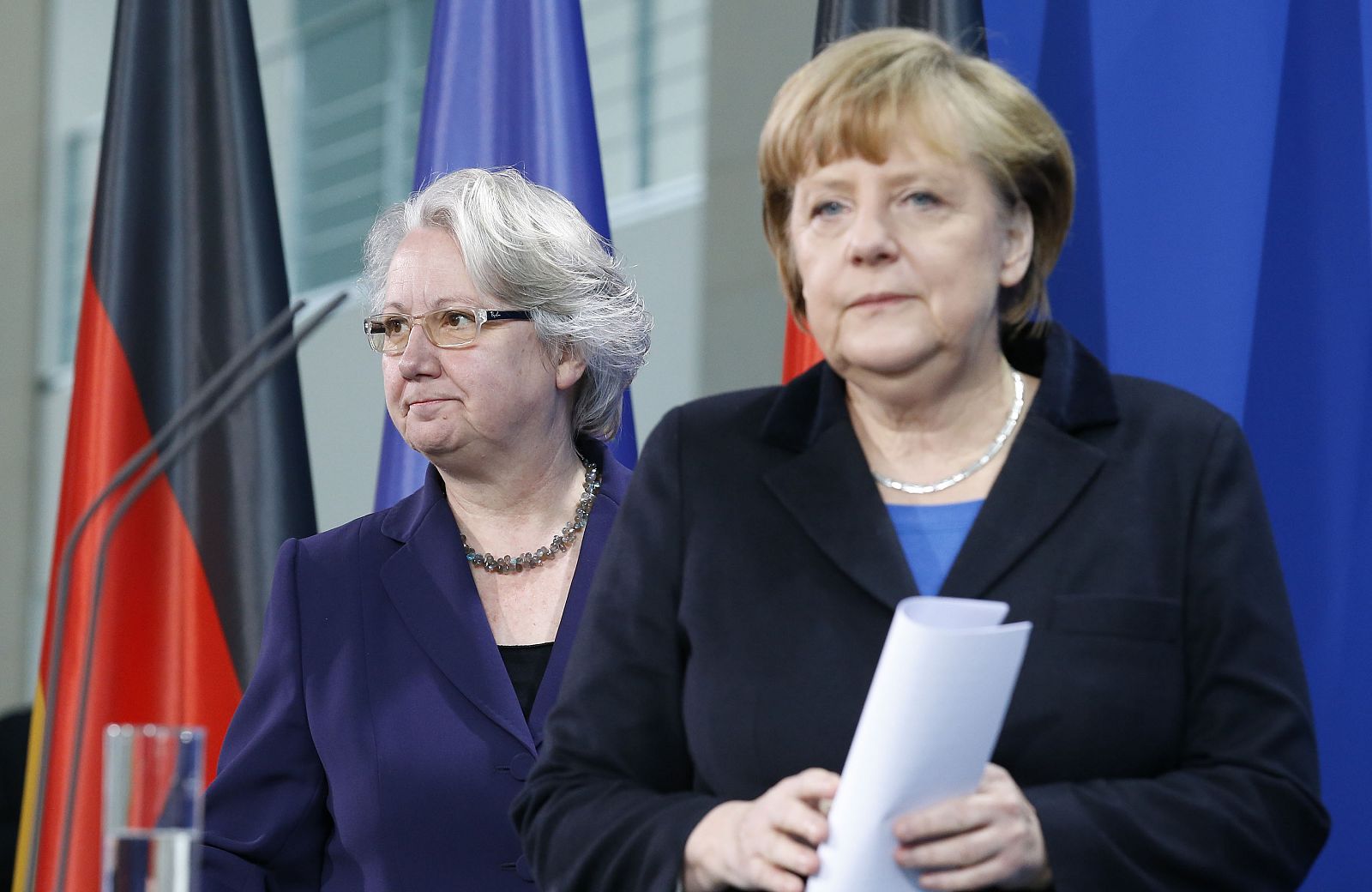 German Chancellor Merkel and Education Minister Schavan arrive for statement to media in Berlin