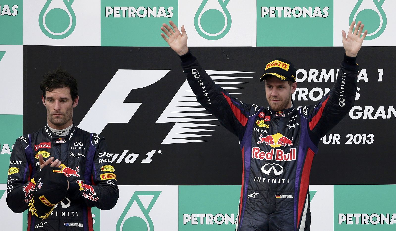 Imagen de Sebastian Vettel y Mark Webber en el podio de Sepang.