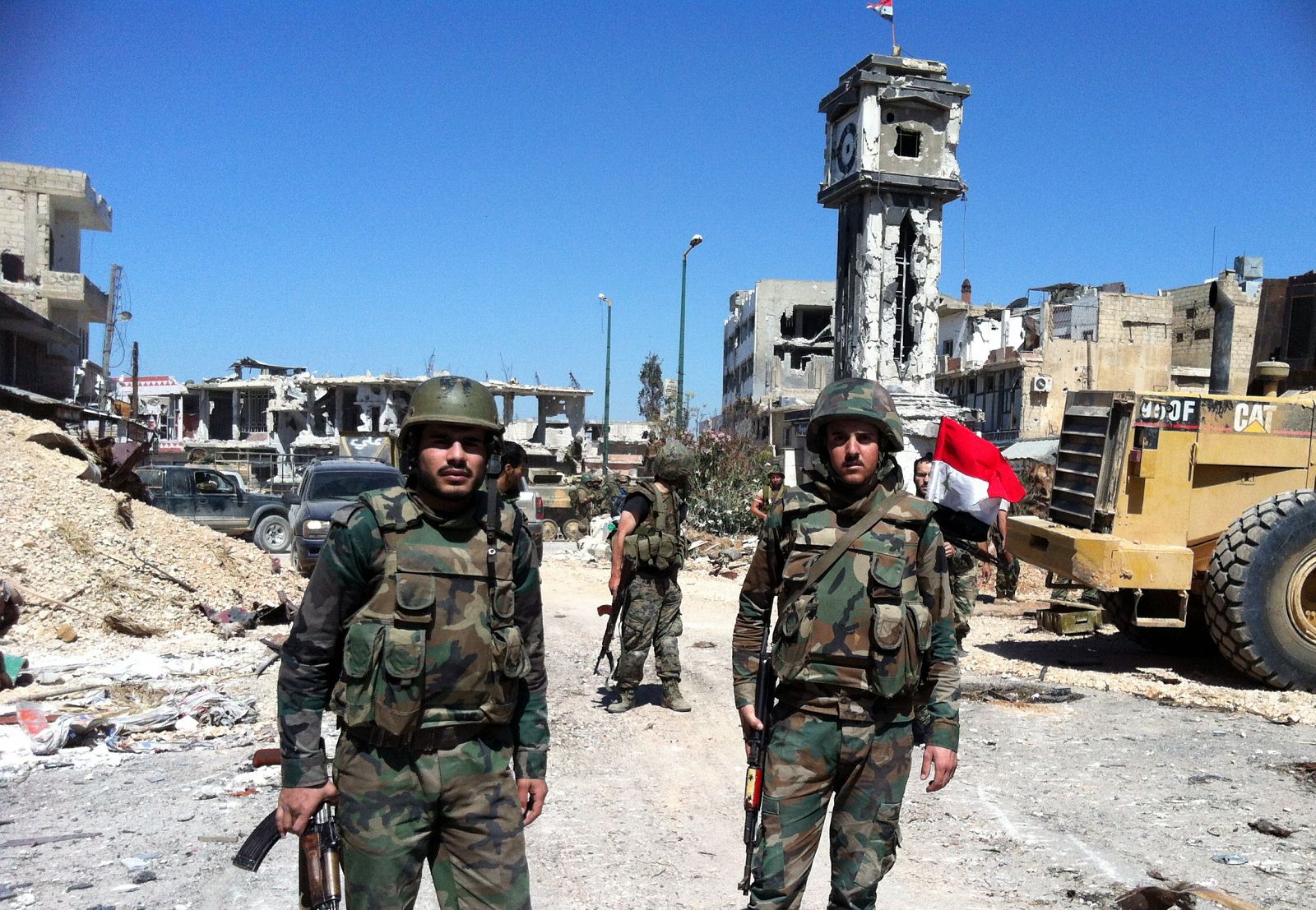 Soldados del gobierno sirio en el centro de la localidad de Al Qusair