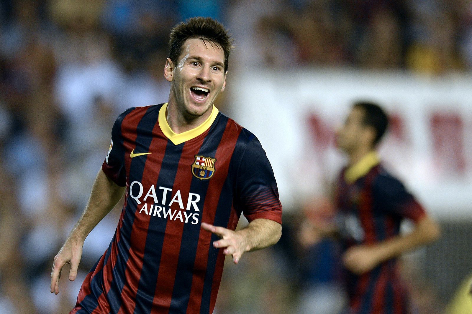 Messi celebra uno de sus tres tantos al Valencia.