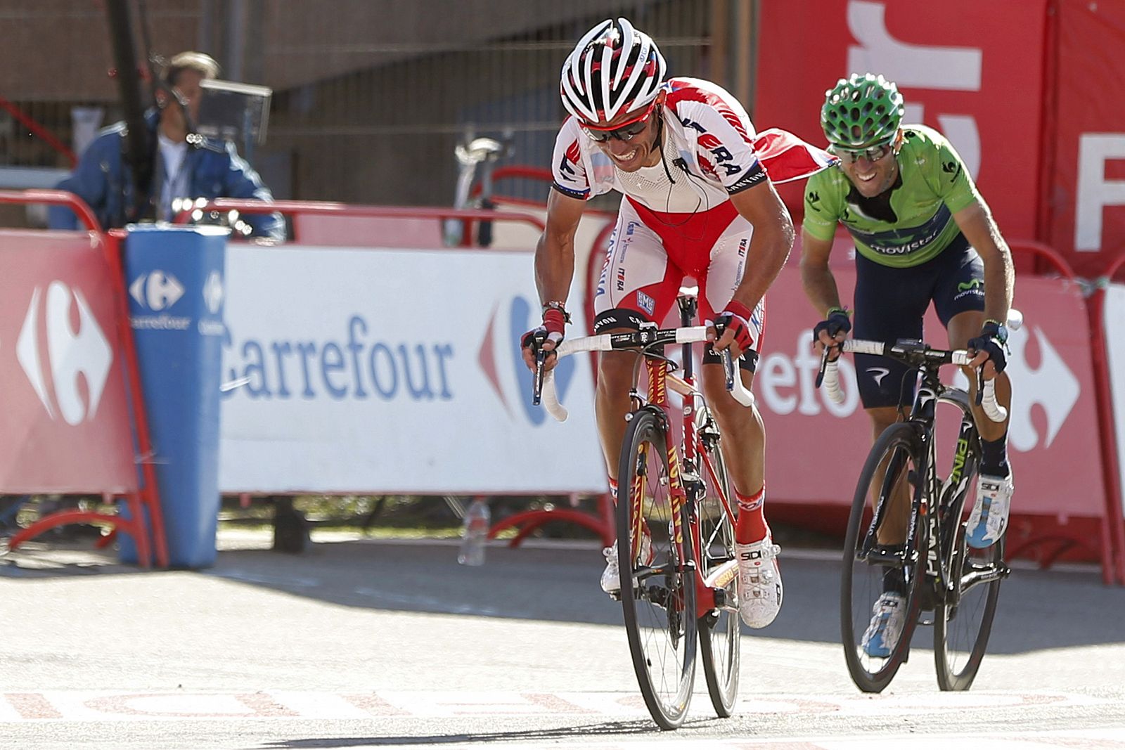 Joaquim Rodríguez "Purito" y Alejandro Valverde a su llegada a la meta de la decimoctava etapa de la Vuelta.