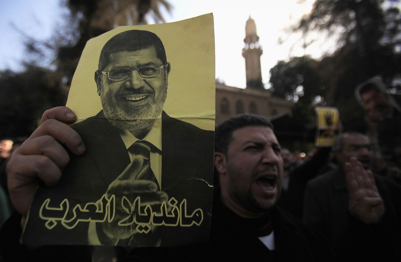 Member of Muslim Brotherhood and supporter of ousted Egyptian President Mursi shouts slogans against military and interior ministry, in front of Al Rayyan mosque after Friday prayers in the southern suburb of Maadi, outskirts of Cairo