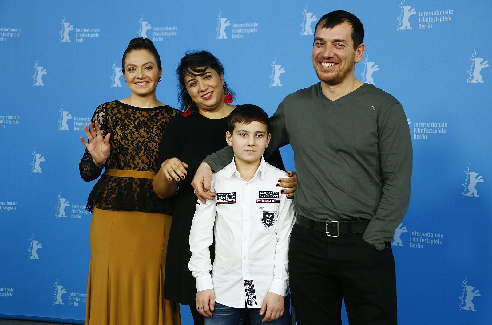 Director Mortezai poses with her cast during a photocall to promote the movie "Macondo" at the 64th Berlinale International Film Festival in Berlin