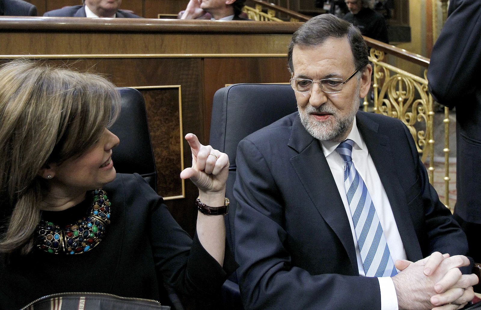 Rajoy junto a la vicepresidenta al inicio del debate del estado de la nación