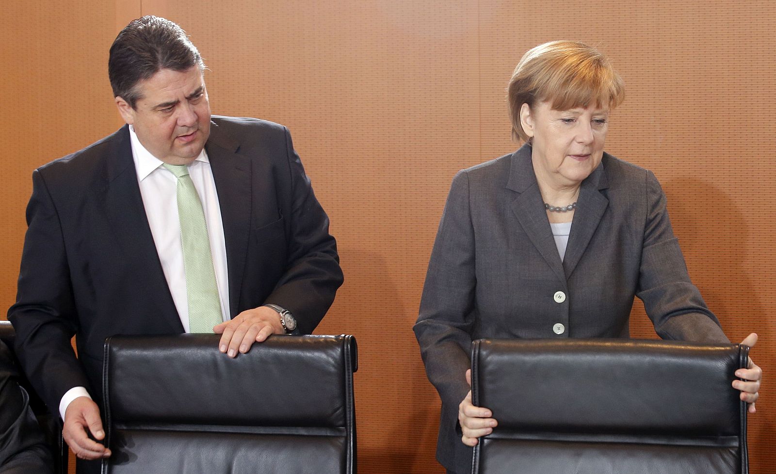 German Chancellor Merkel and Economy Minister Gabriel arrive to attend a cabinet meeting at the Chancellery in Berlin