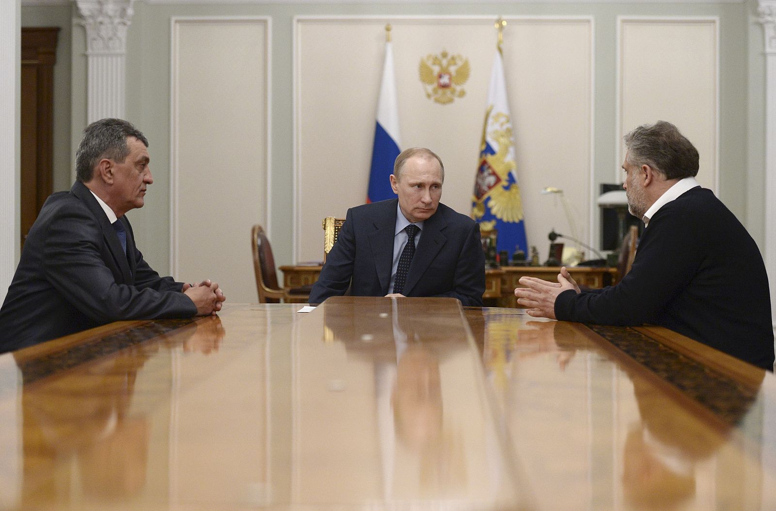 Russian President Putin meets with former deputy commander of the Russian Black Sea Fleet Vice-Admiral Menyailo and Sevastopol head Chaliy at Novo-Ogaryovo state residence outside Moscow