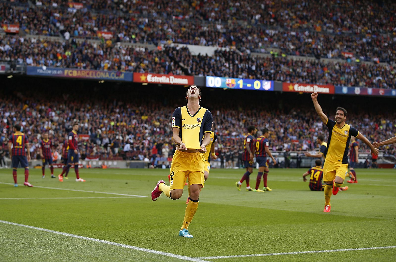 El uruguayo Godín celebra el gol del empate que vale una Liga en el Camp Nou.