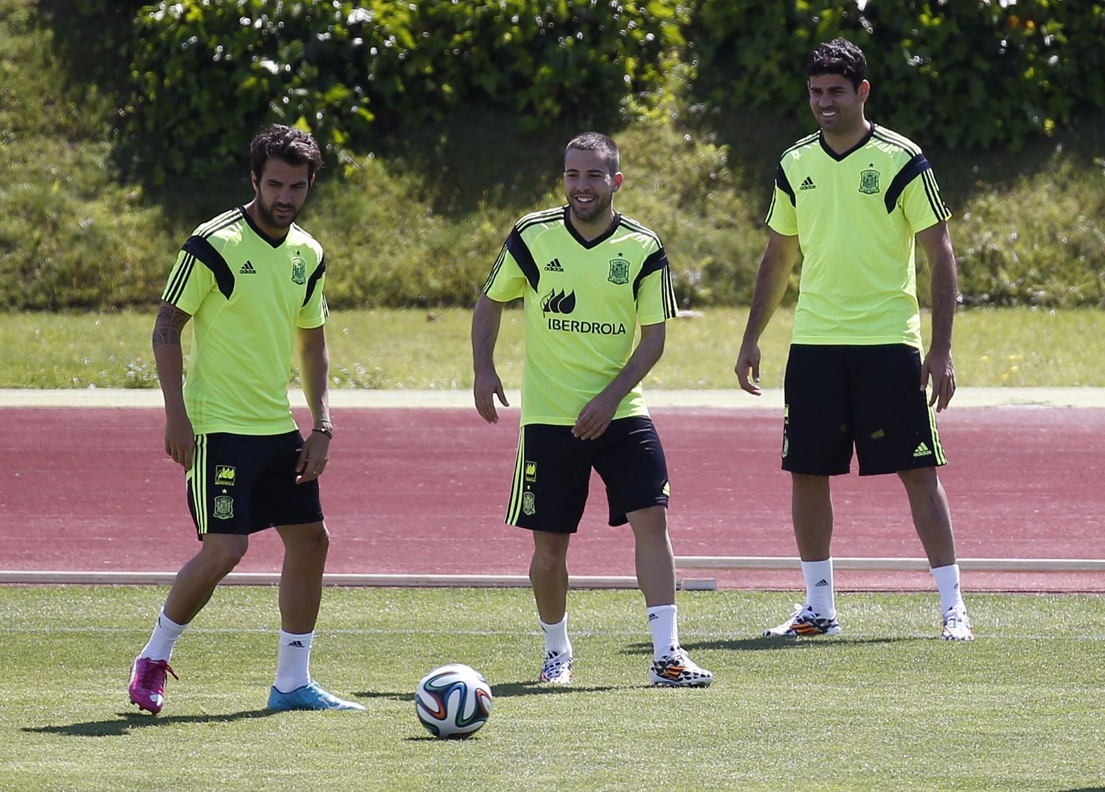 Spanish national soccer players Cesc Fabregas, Jordi Alba and Diego Costa attend a training session of Spain's national soccer team at Las Rozas playground near Madrid