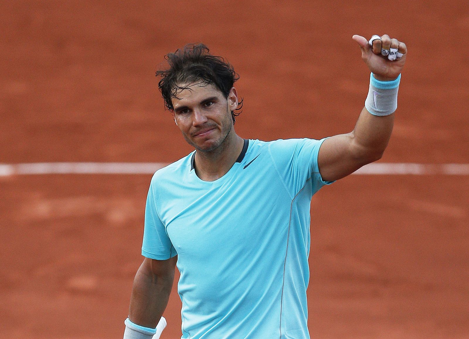 El tenista español Rafael Nadal celebra su victoria ante su compatriota David Ferrer