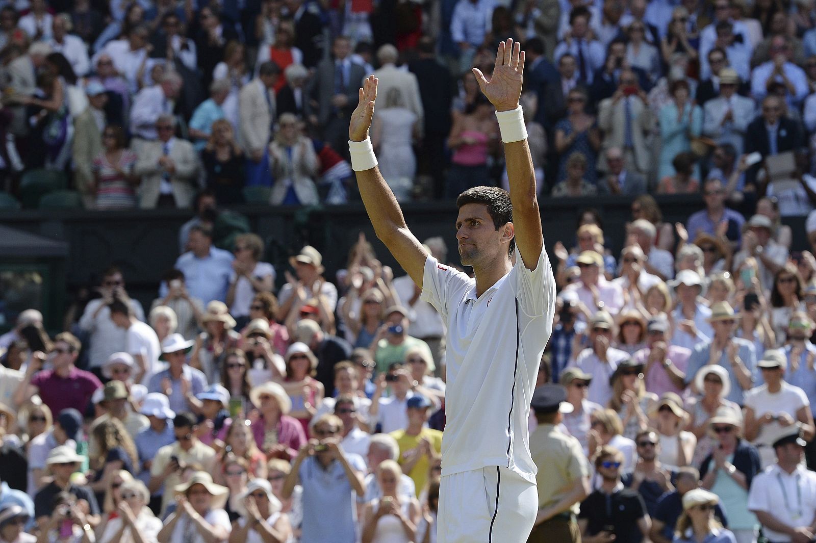 Novak Djokovic celebra su pase a la final de Wimbledon 2014