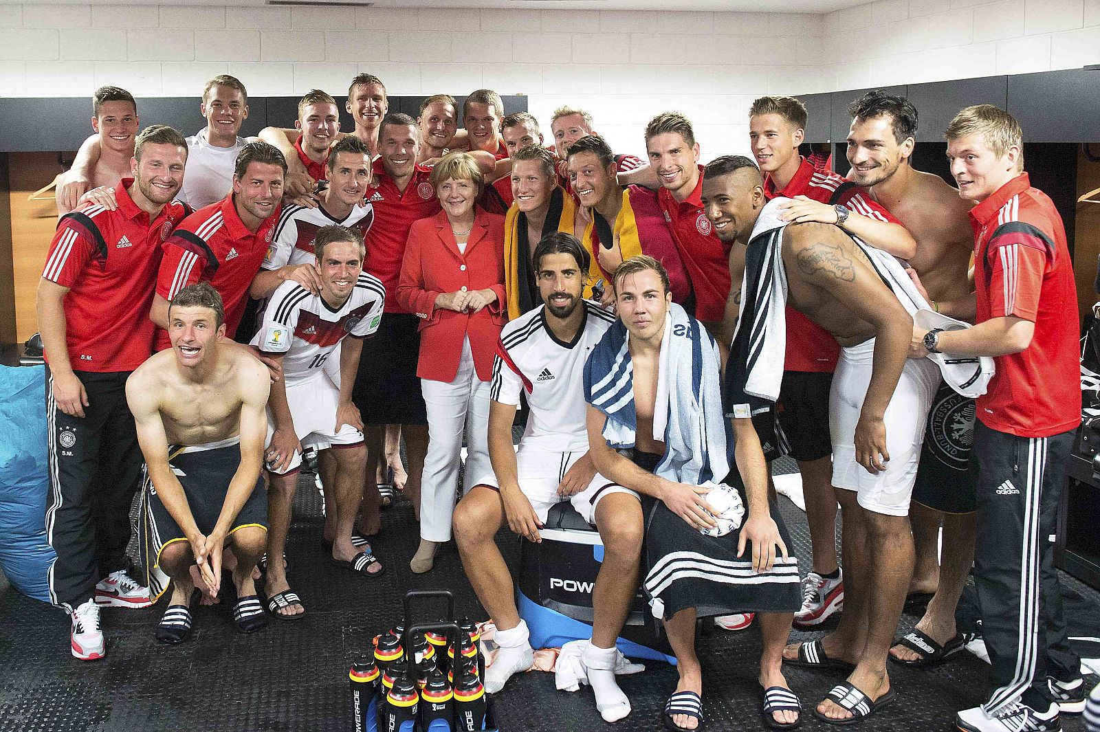 File photo of German Chancellor Merkel posing with the German national soccer squad in Salvador