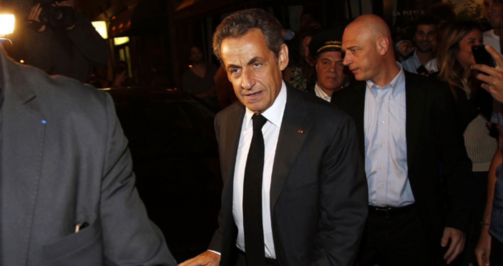 File picture shows former French president Nicolas Sarkozy leaving a restaurant in Paris