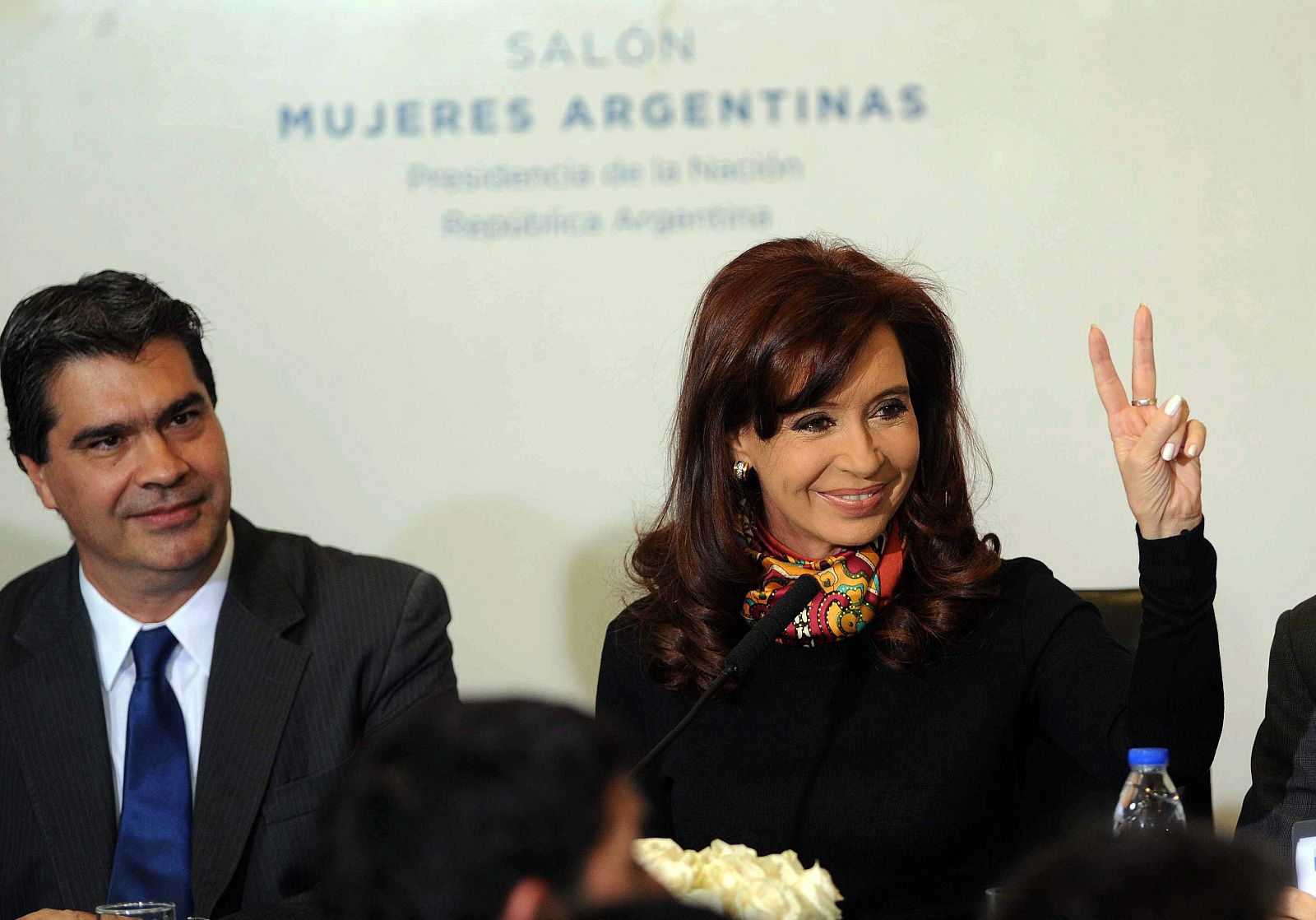 La presidenta de Argentina, Cristina Fernández, junto a su jefe de gabinete, Jorge Capitanich