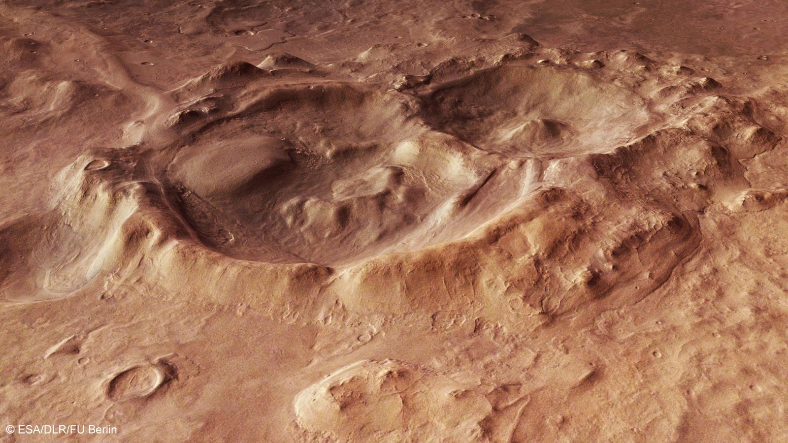 Dos enormes cráteres en la cuenca de Hellas Planitia.