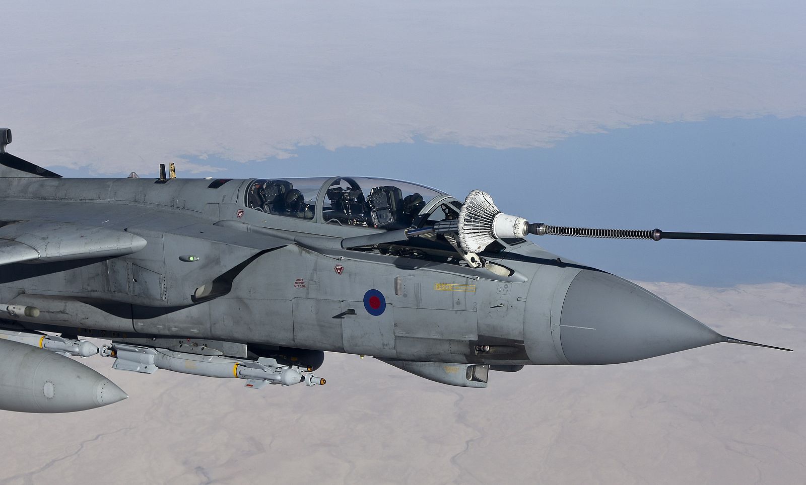 An RAF Tornado GR4 refuels from a Voyager tanker during it's first combat mission flown out of Akrotiri, Cyprus