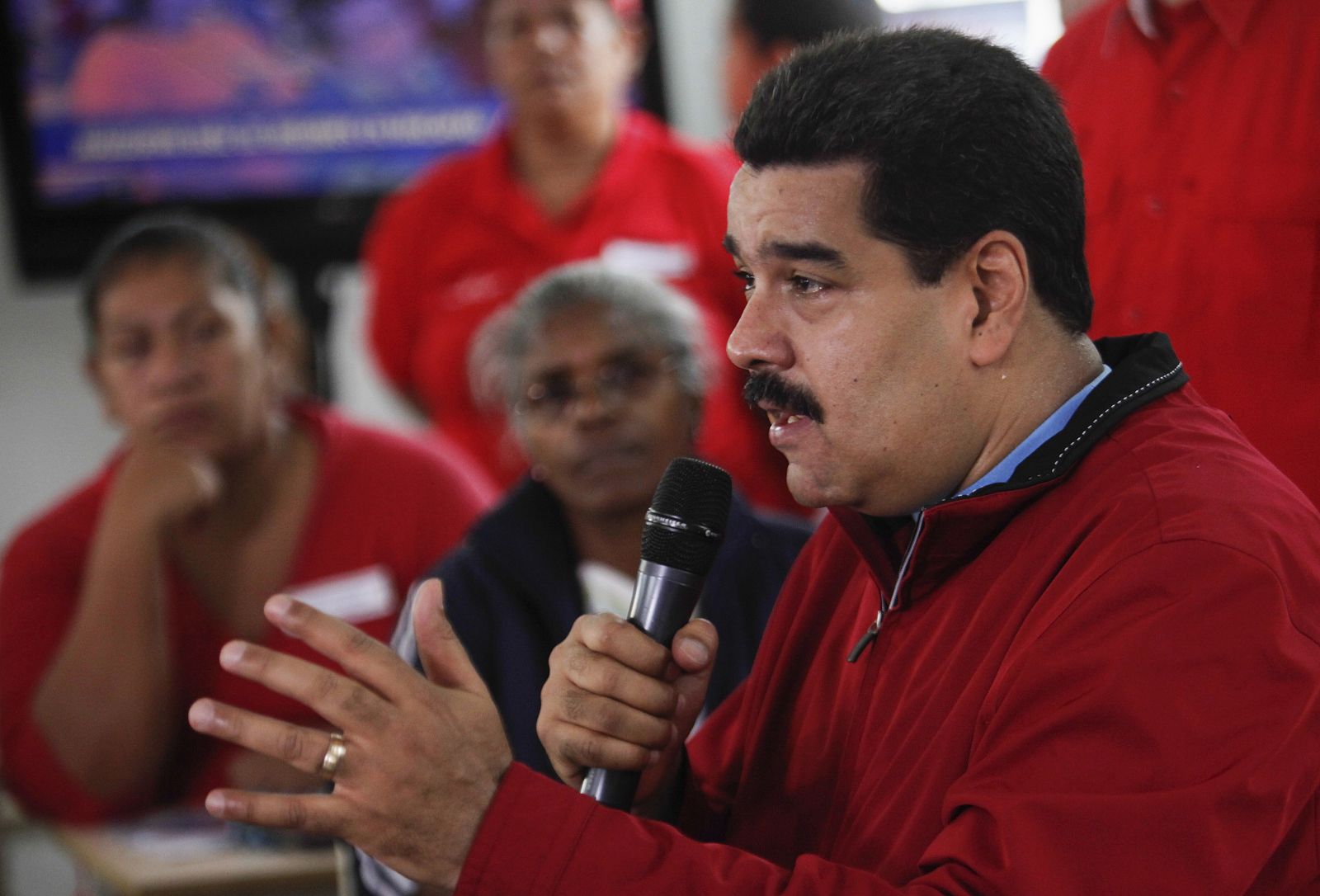 Venezuela's President Nicolas Maduro speaks during a meeting with supporters outside Caracas