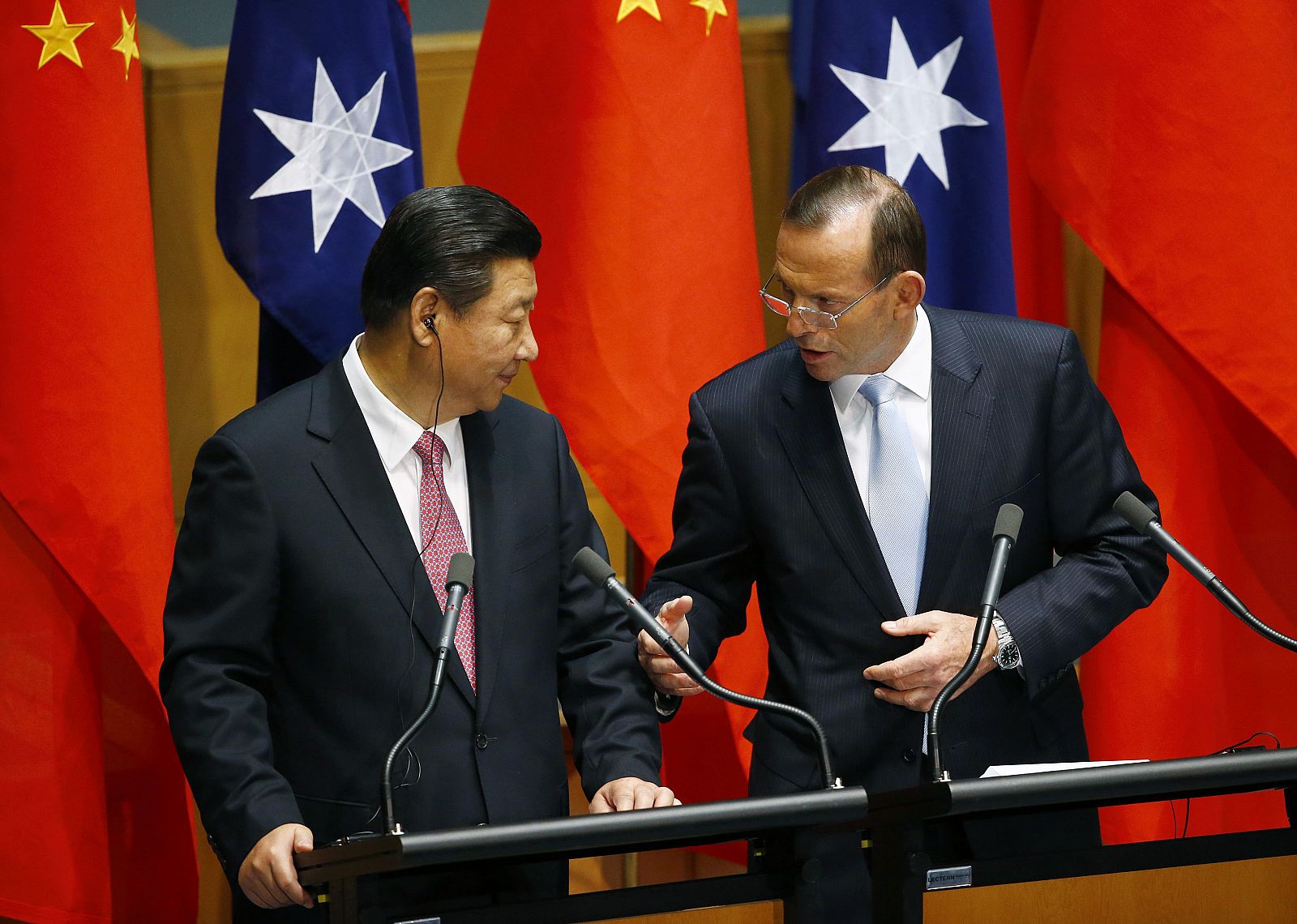 El presidente chino, Xi Jinping, junto al primer ministro australiano, Tony Abbott