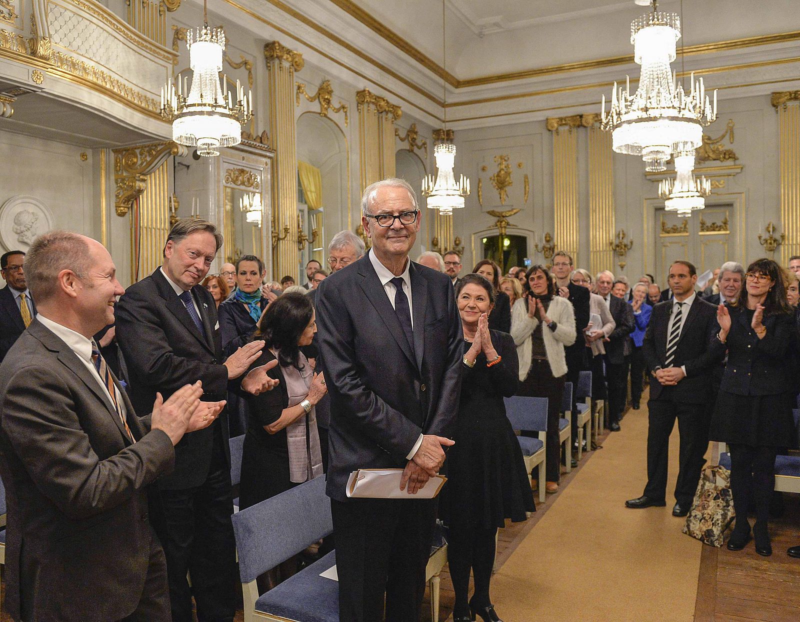 French novelist and 2014 Nobel Prize winner for literature Patrick Modiano receives an applause before his Nobel lecture at the Swedish academy in Stockholm