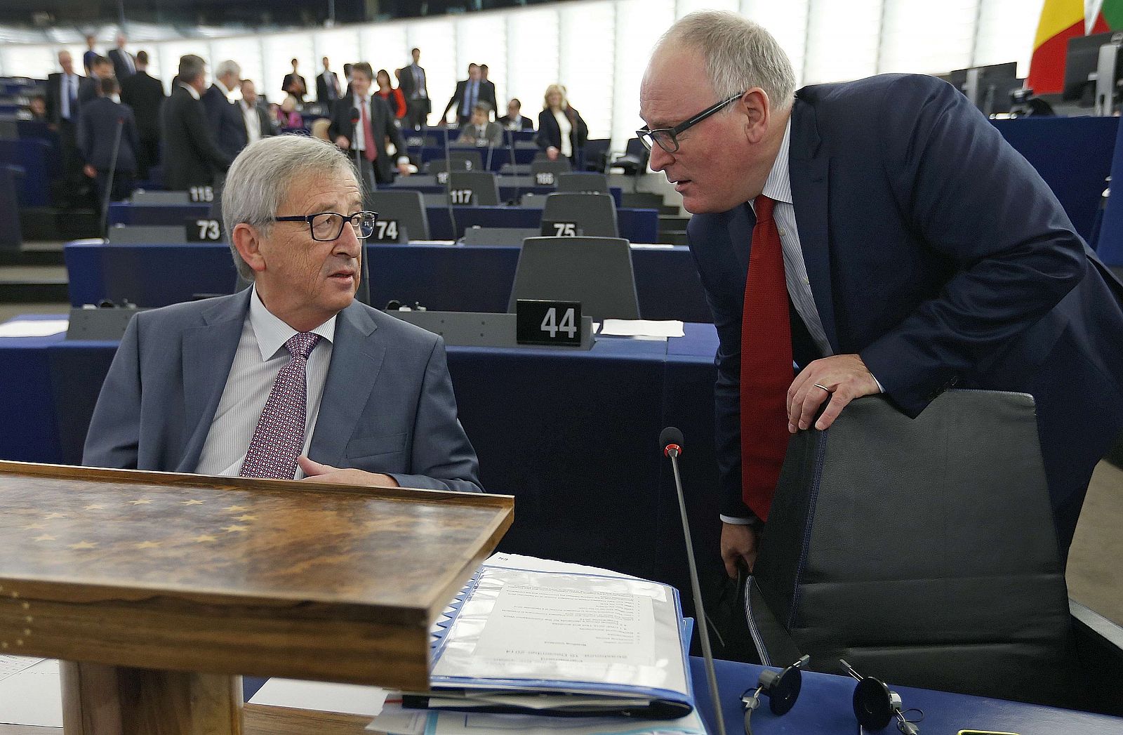 European Commission President Juncker talks to First Vice-President of the Commission Timmermans, ahead of his address to the European Parliament to present the Commission work program for 2015 in Strasbourg