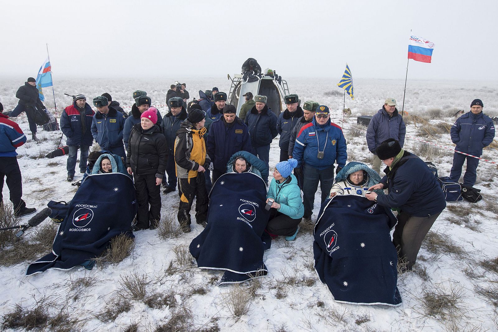 The International Space Station crew of Elena Serova and Alexander Samokutyaev of Russia and Barry Wilmore of the  U.S., rests shortly after landing southeast of Dzhezkazgan in central  Kazakhstan