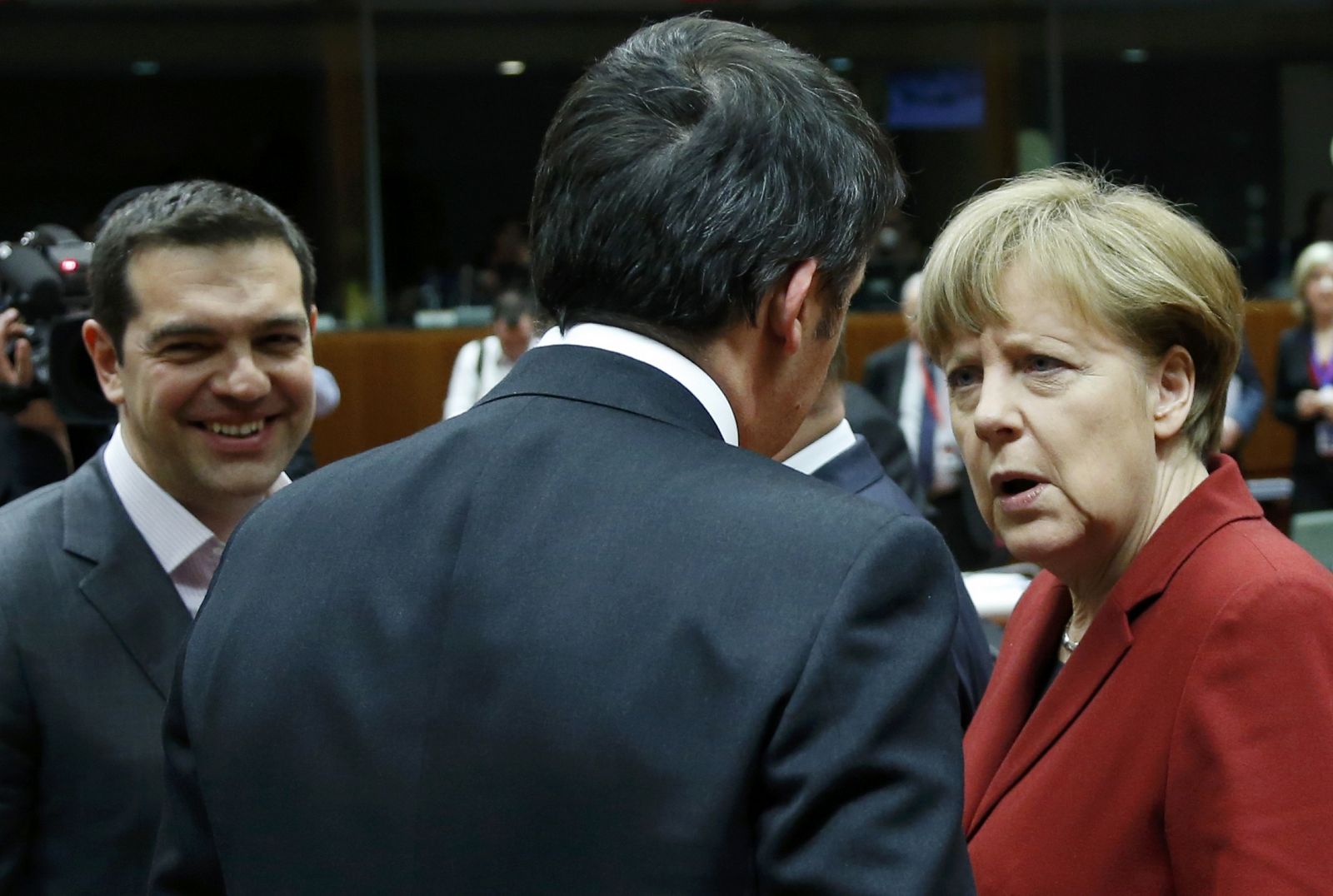 El primer ministro griego, Alexis Tsipras, junto al de Italia, Matteo Renzi, y la canciller alemana, Angela Merkel