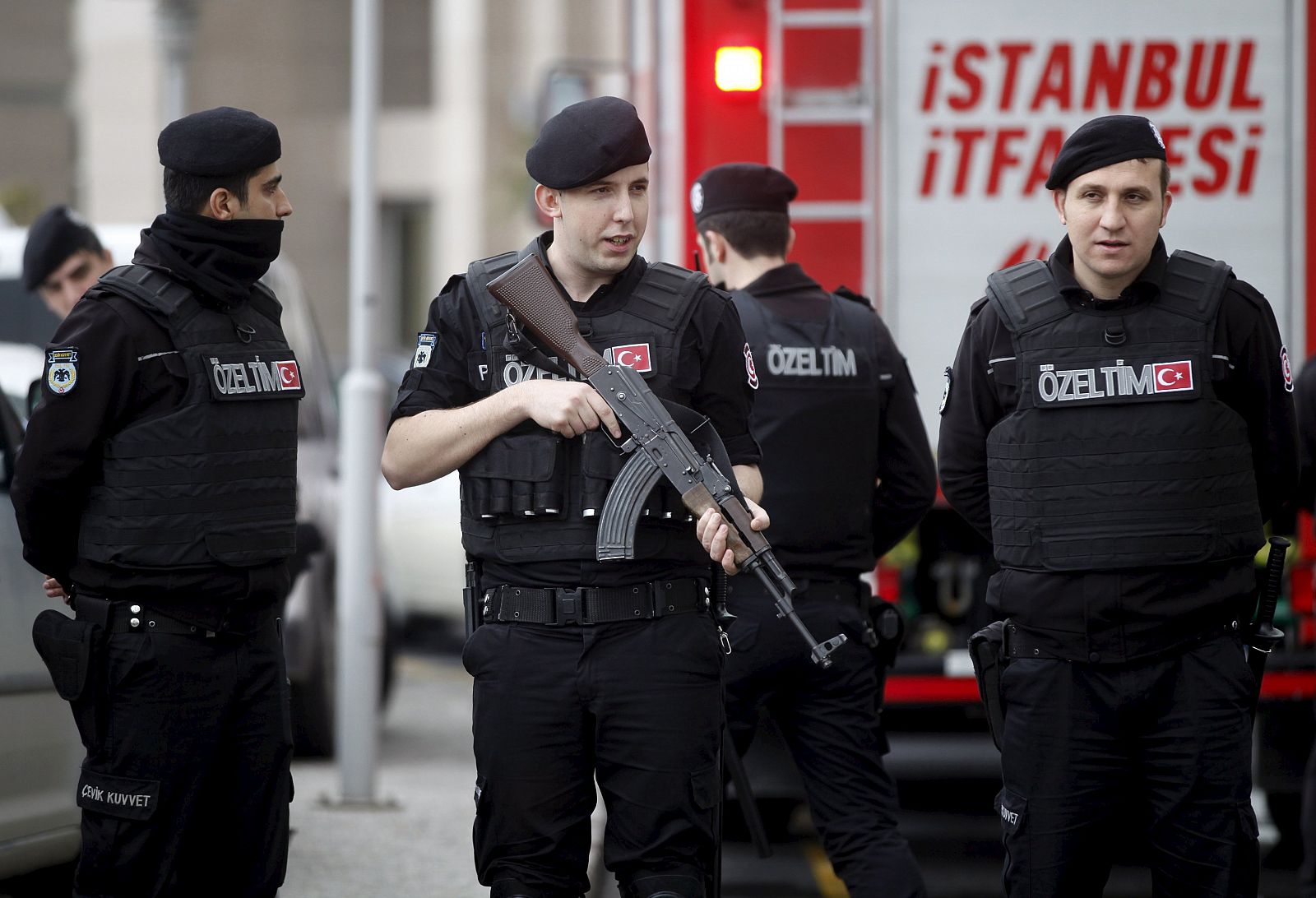 Turkish riot police stand guard in front of the Justice Palace in Istanbul