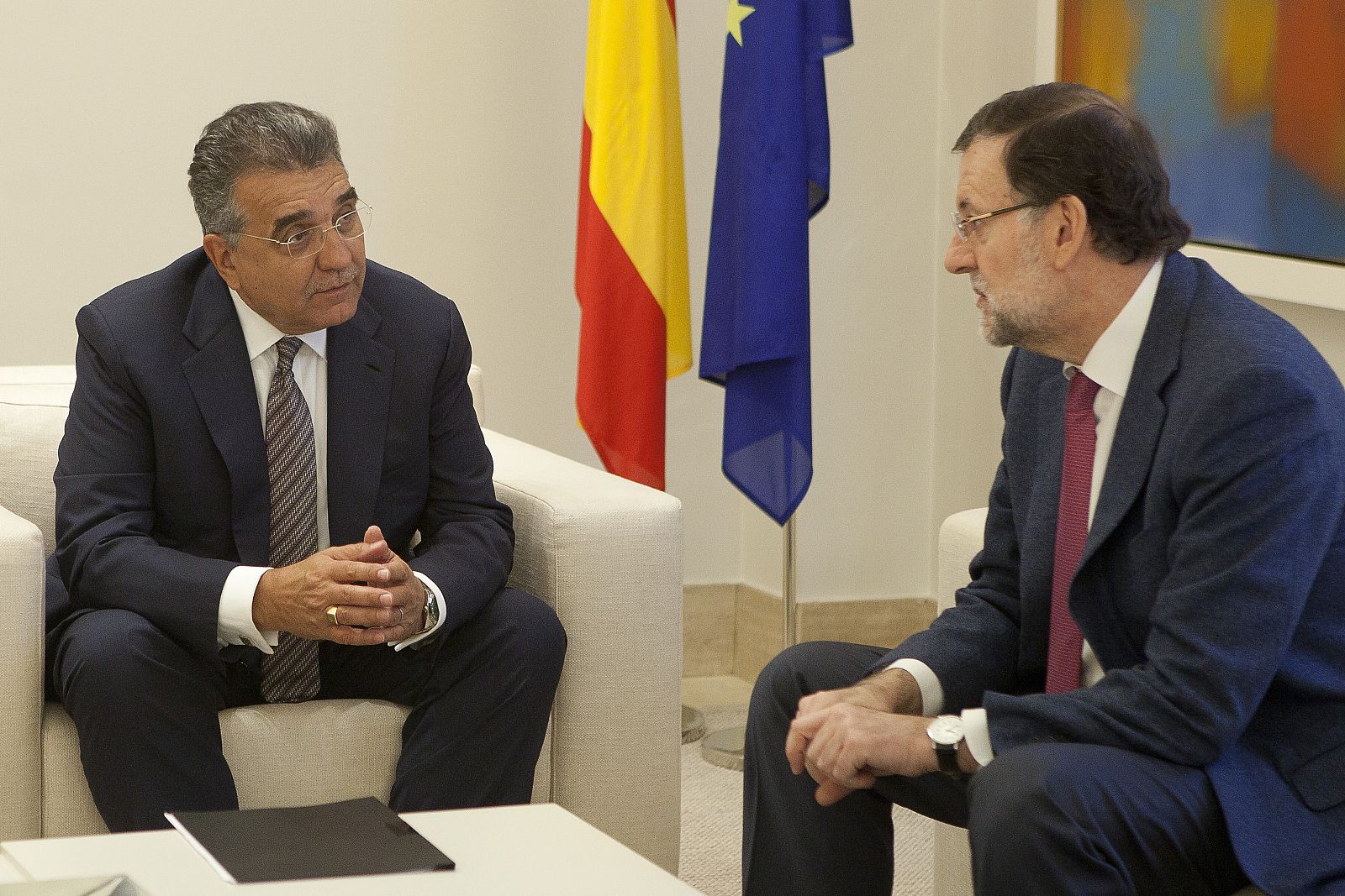 El vicepresidente mundial de Compras del Grupo Volkswagen, Francisco Javier García Sanz, junto al presidente del Gobierno, Mariano Rajoy