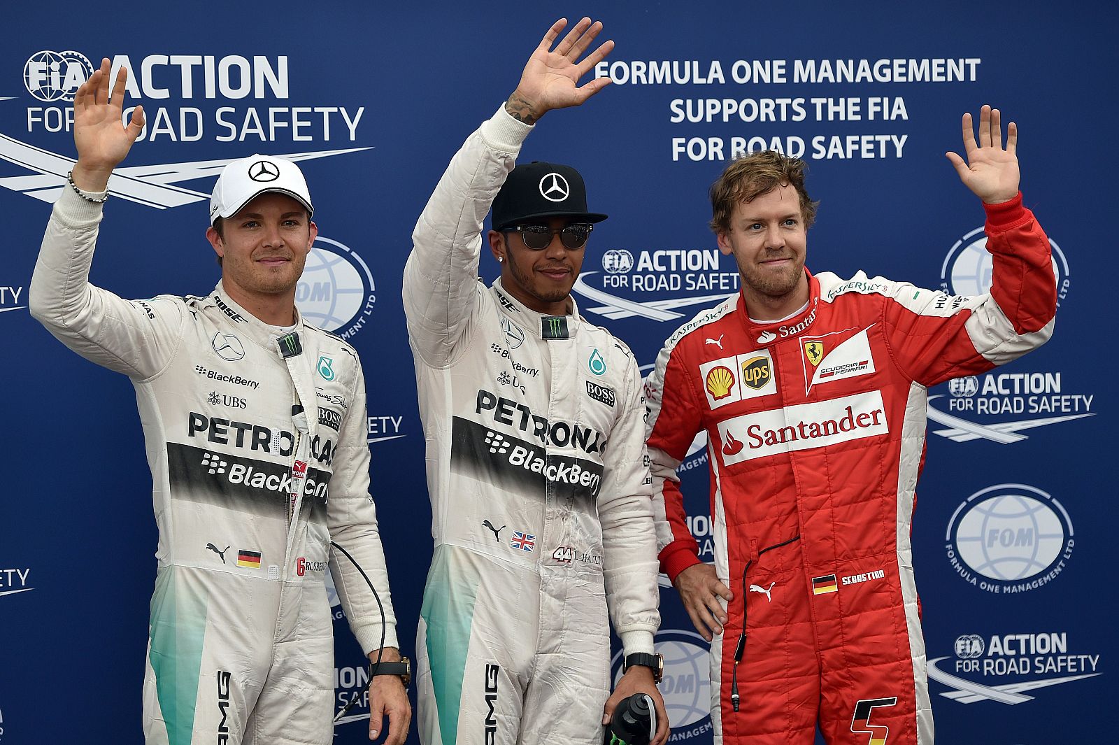 Hamilton, escltado por Rosberg y Vettel en el podio de Mónaco.
