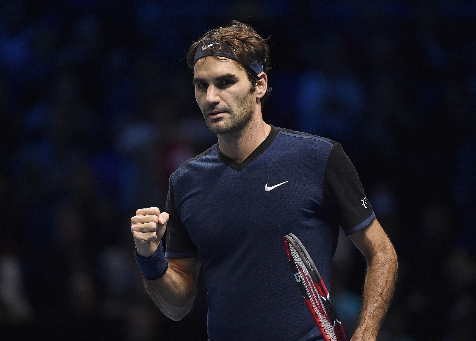 Federer celebra su victoria ante Djokovic.