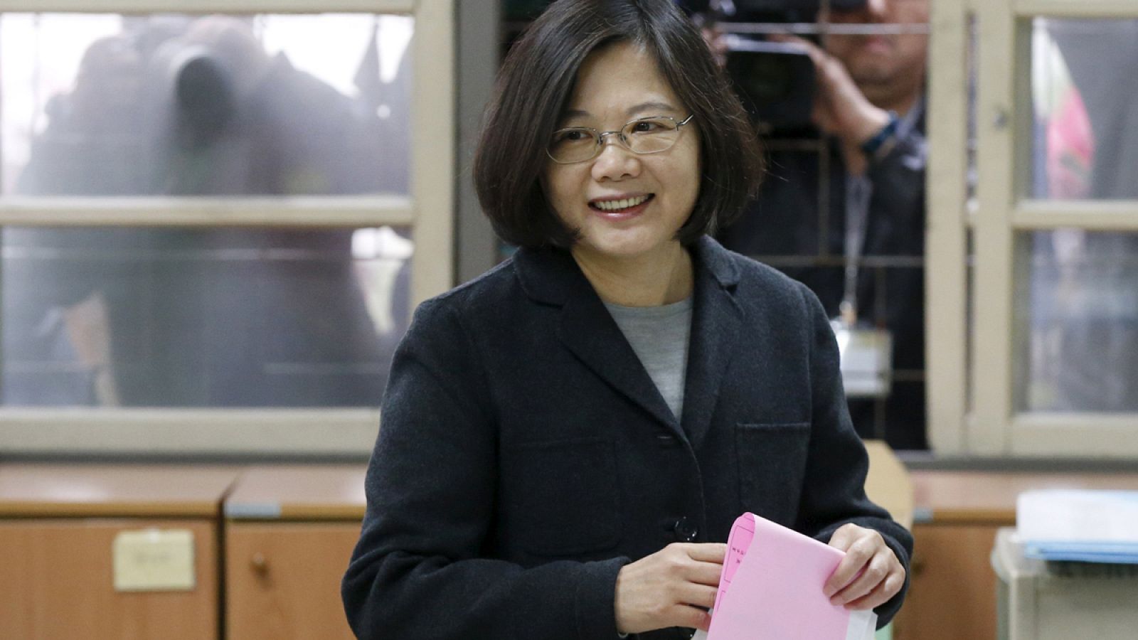 Taiwan's Democratic Progressive Party (DPP) Chairperson and presidential candidate Tsai Ing-wen casts her ballot at a polling station during general elections in New Taipei, Taiwan