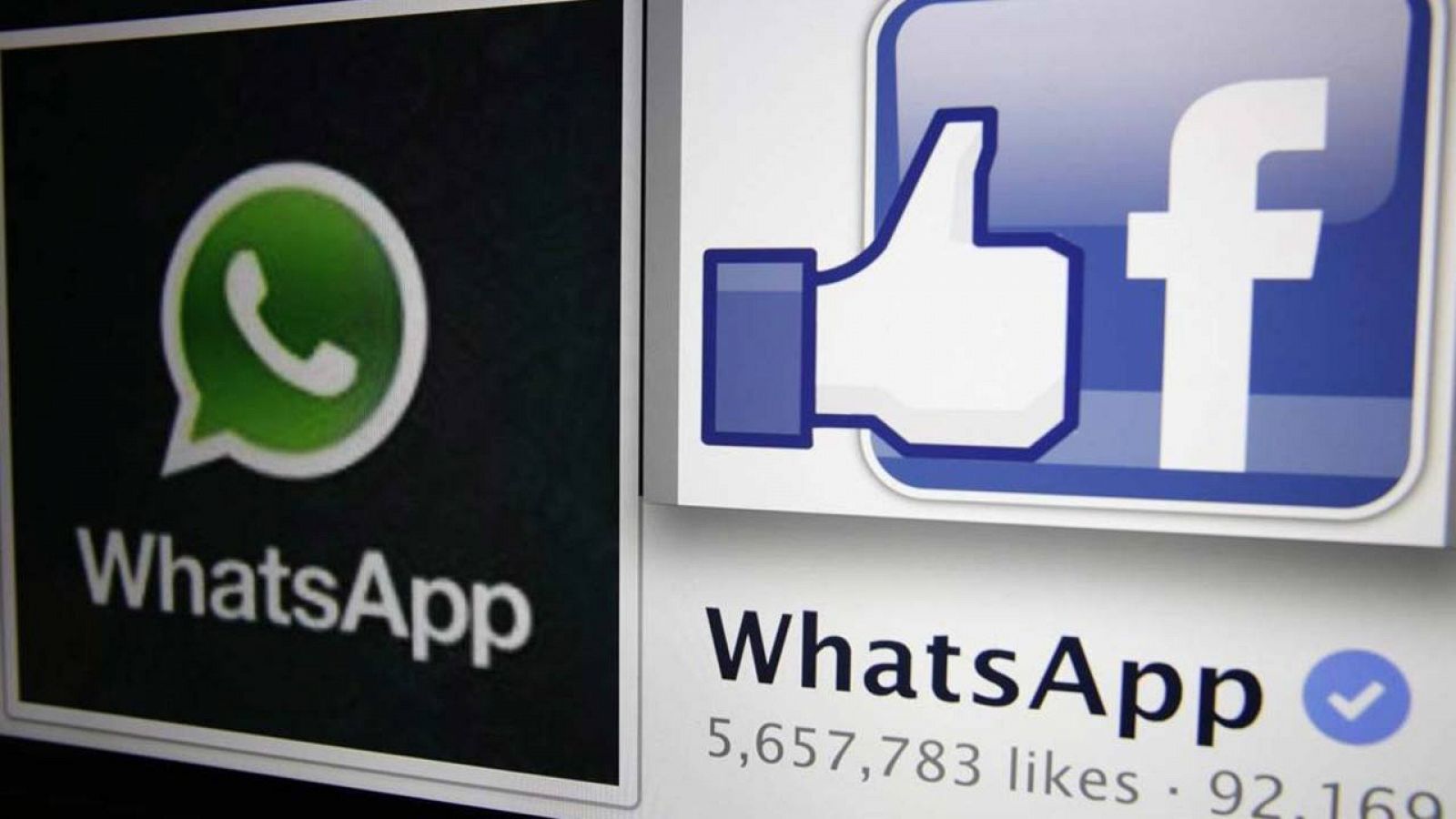 Los logos de WhatsApp y Facebook sobre una pantalla