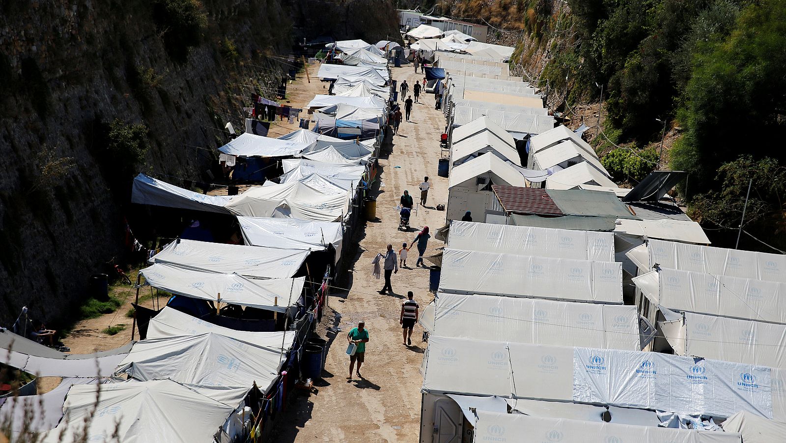 Refugiados y migrantes en el campo de acogimiento de Souda, en la isla de Kios, Grecia