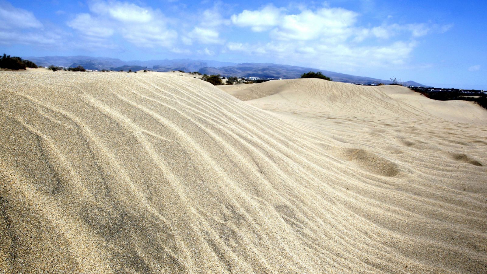 Imagen de archivo de las dunas de Maspalomas, uno de los iconos de Gran Canaria, por el que pasan cada año millones de turistas.